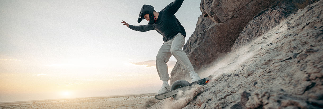 Onewheel GT carving the hillside Onewheel GT carving the hillside
